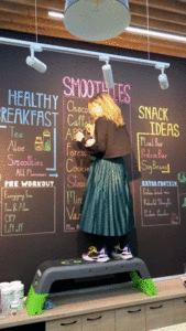 Melika Monjazi and her chalk wall